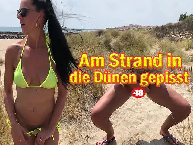 Am Strand in die Dünen gepisst.