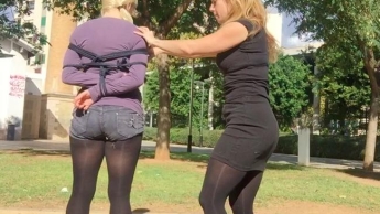 Bondage in a public parc