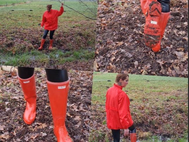 Rote Gummistiefel und Regenjacke