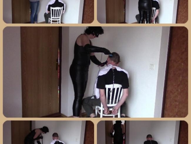 Sexy stylist in leather. Part 1: Haircut handcuffed customer.