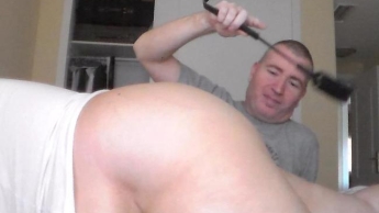 Spanking Her Ass with a Toy