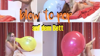 blow to pop auf dem Bett