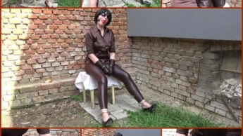 Angela handcuffed in brown leather leggings and gloves