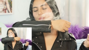 Lucy raucht mit ihrer Lederjacke
