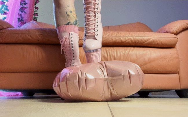 Ballon mit Absätzen platzen lassen