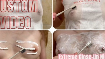 Extreme Nahaufnahme: Nippel werden mit Zahnbürste und Zahnpasta geärgert.