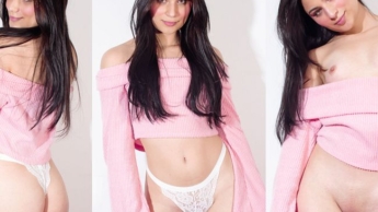 Girl in pink with green eyes fondles her pussy!!!